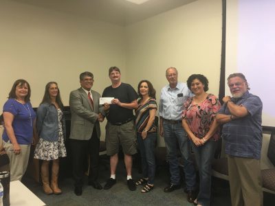 Supervisor Rios presents check to CCEDC for 2016-17 goals of improving employment and tourism